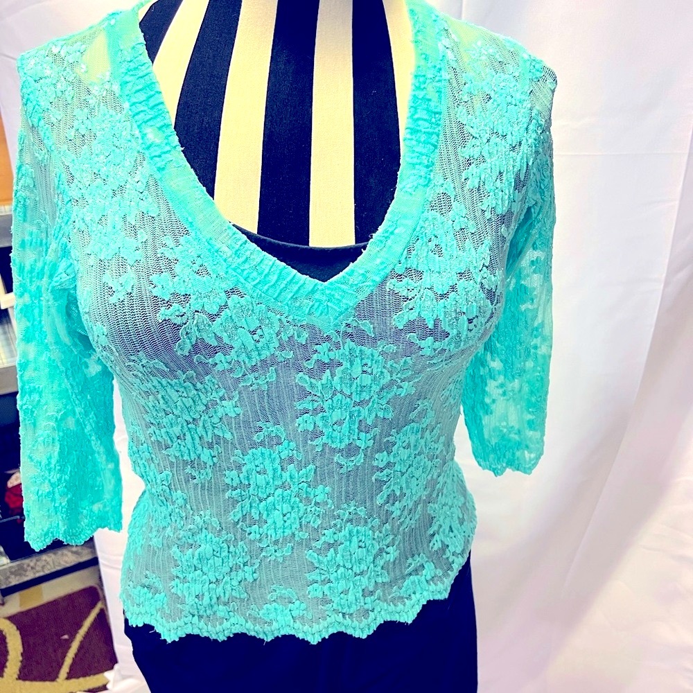 Aqua lace Moda v-neck blouse. Never worn.
